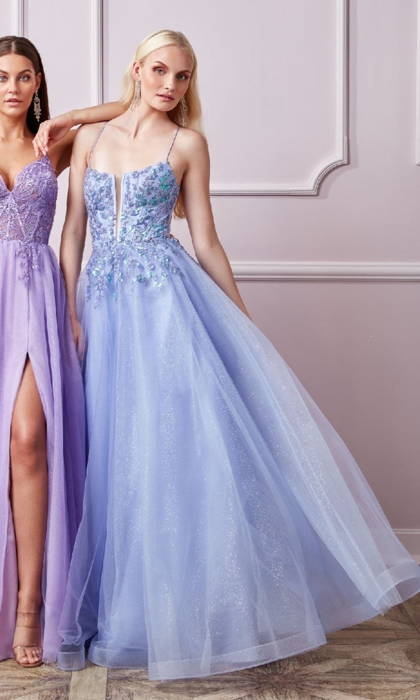Two women pose in pastel gowns: one in the Deep V-Neck Long Prom Ball Gown, Aerie Couture 265, a light purple dress with a high slit; the other in a light blue tulle A-line gown featuring spaghetti straps and a fitted bodice.